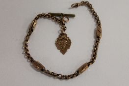 A 9ct gold Albert chain with fob, 31.7g. CONDITION REPORT: Good condition.