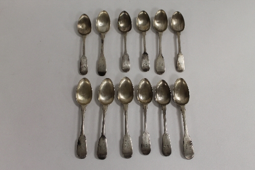 Twelve early nineteenth century Newcastle silver teaspoons. (12) CONDITION REPORT: Good condition