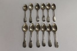 Twelve early nineteenth century Newcastle silver teaspoons. (12) CONDITION REPORT: Good condition
