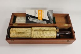 A W.F.Stanley & Co. Fuller Calculator, in a mahogany case. CONDITION REPORT: Good condition, with