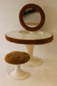 A 1970's moulded white poly resin dressing table and stool, width 112 cm. CONDITION REPORT: An