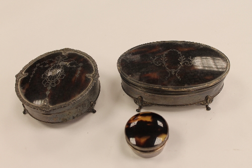 Two tortoiseshell and silver dressing table pots, Mappin & Webb, Birmingham 1915, together with
