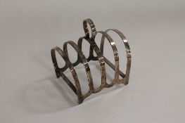 A silver toast rack, Sheffield 1944. CONDITION REPORT: Good condition.