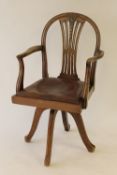 An Edwardian mahogany swivel chair. CONDITION REPORT: Good condition.