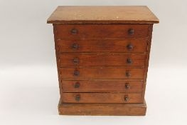 A Victorian stained beech wood miniature chest of six drawers, height 42 cm. CONDITION REPORT: