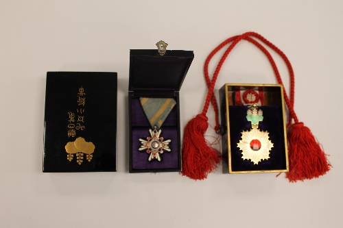 A fine Japanese enamel medal - Order of the Rising Sun, together with another Japanese medal - Order