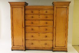 A Victorian pine sentry door compactum wardrobe, width 237 cm. CONDITION REPORT: Good condition,