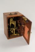 A brass achromatic microscope by R & J Beck Ltd. London, in a fitted mahogany case. CONDITION