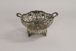A silver twin handled basket, Birmingham 1900. CONDITION REPORT: Good condition.