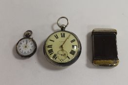 A silver pocket watch, Chester 1891, together with a small silver and enamel fob watch and a vesta