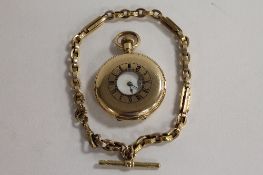 An A.W.Waltham pocket watch, suspended on a 9ct gold Albert chain. (2) CONDITION REPORT: Good