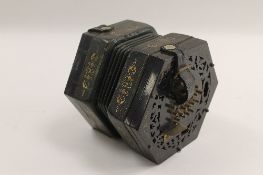 A forty-eight button concertina. CONDITION REPORT: Fair condition, some buttons need attention but