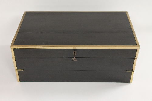 A nineteenth century ebony and brass bound writing slope, width 42 cm. CONDITION REPORT: Good / Fair