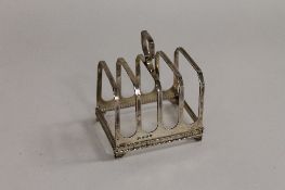 A silver toast rack, Birmingham 1941. CONDITION REPORT: Good condition.