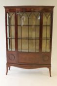 A Victorian mahogany bow-fronted display cabinet, width 123 cm. CONDITION REPORT: Fair / good