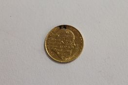 A gold half Sovereign - 1908. CONDITION REPORT: Drilled and also engraved to the head side - 'LW