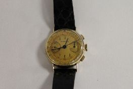 A 14ct gold Gentleman's Marvin wrist watch. CONDITION REPORT: On later black leather strap. The