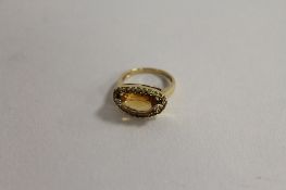 A 9ct gold yellow sapphire, citrine and diamond ring. CONDITION REPORT: Good condition.