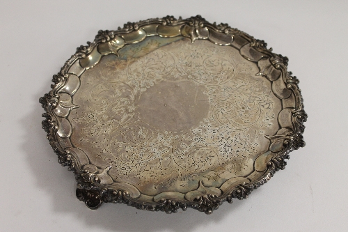A silver tray with shell scroll borders, London 1842, 31 oz. CONDITION REPORT: Good condition.