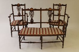 An Edwardian inlaid seven piece drawing room suite. (7) CONDITION REPORT: Comprising - two seater
