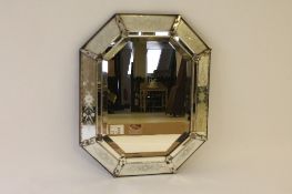 A nineteenth century Venetian cushion mirror, width 66 cm. CONDITION REPORT: Fair condtion.