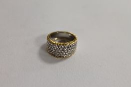 An 18ct white gold diamond half eternity cluster ring , approximately 1.76ct. CONDITION REPORT: Good