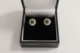 A pair of 9ct gold treated black and white diamond earrings. (2) CONDITION REPORT: Good condition.