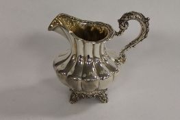 A silver milk jug, London 1835. CONDITION REPORT: Good condition.