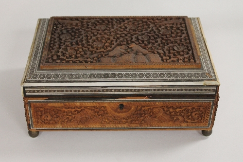 An early twentieth century Anglo-Indian carved and inlaid jewellery casket, width 31 cm. CONDITION