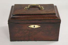 A George III mahogany tea caddy, width 26.5 cm. CONDITION REPORT: Sadly missing the interior, but