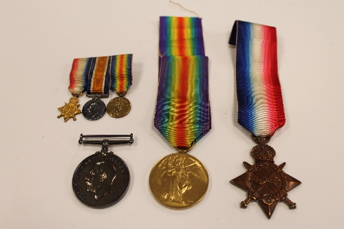 Three WW I medals awarded to W.H.Fraser, Eng. LT.CR. R.N., together with the miniature medals of the