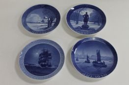 Four early twentieth century Royal Copenhagen blue and white plates - 1923, 1924, 1930 & 1932. (4)