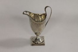 A George III silver cream jug, Peter and Ann Bateman, London 1791. CONDITION REPORT: Good