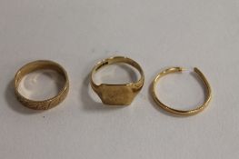 Two 9ct gold rings, together with an 18ct gold wedding band. (3) CONDITION REPORT: Two 9ct gold