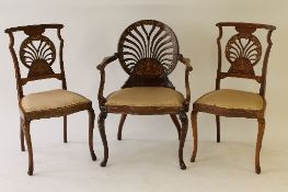A Victorian inlaid mahogany salon armchair, together with a pair of matching single chairs. (3)