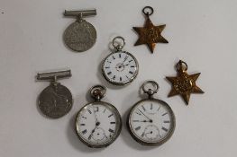Four WW II defence medals, together with three continental silver pocket watches. (7) CONDITION