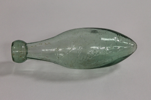 An early Hamilton torpedo Schweppes glass bottle, height 18 cm. CONDITION REPORT: Good condition,