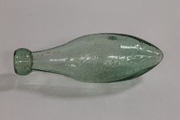An early Hamilton torpedo Schweppes glass bottle, height 18 cm. CONDITION REPORT: Good condition,
