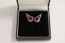 A pair of 9ct gold amethyst, pink topaz and diamond earrings. (2) CONDITION REPORT: Good condition