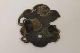A Japanese mixed metal bronze Meiji period plaque, width 7 cm. Good condition and detail.