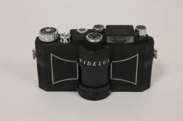 A Widelux F7, with 26mm lens, No. 473075. Good condition.