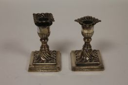 A pair of silver squat candlesticks with detachable sconces, Edinburgh 1896. (2) With loaded