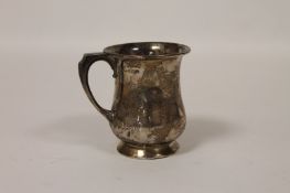 A silver christening mug, Birmingham 1925. A well constructed christening mug in fair condition with