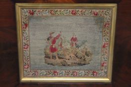An early nineteenth century tapestry sampler, 28 cm x 31 cm, framed. Good condition, unexamined