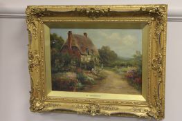 Eva Maryon : A thatched cottage by a country lane, oil on canvas, 27 cm x 38 cm, signed, framed.