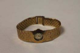 A 9ct gold Lady`s wrist watch by Perona, 36.7g. Good condition, solid 9ct gold bracelet, gross