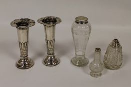 A pair of silver vases, together with three silver mounted glass vases. (4) Condition poor, for