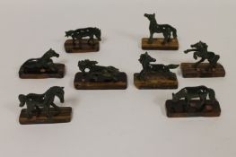 Eight carved jade figures depicting horses, on polished plinths. (8) Condition of the horses good,