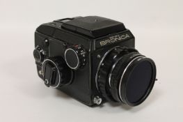 A Zenza Bronica, with Zenzanon 80mm lens, No. 9680203, cased. Good condition.