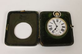 A Mappin & Webb 8-day pocket watch, held in a silver-mounted leather stand. (2) Clasp to the stand